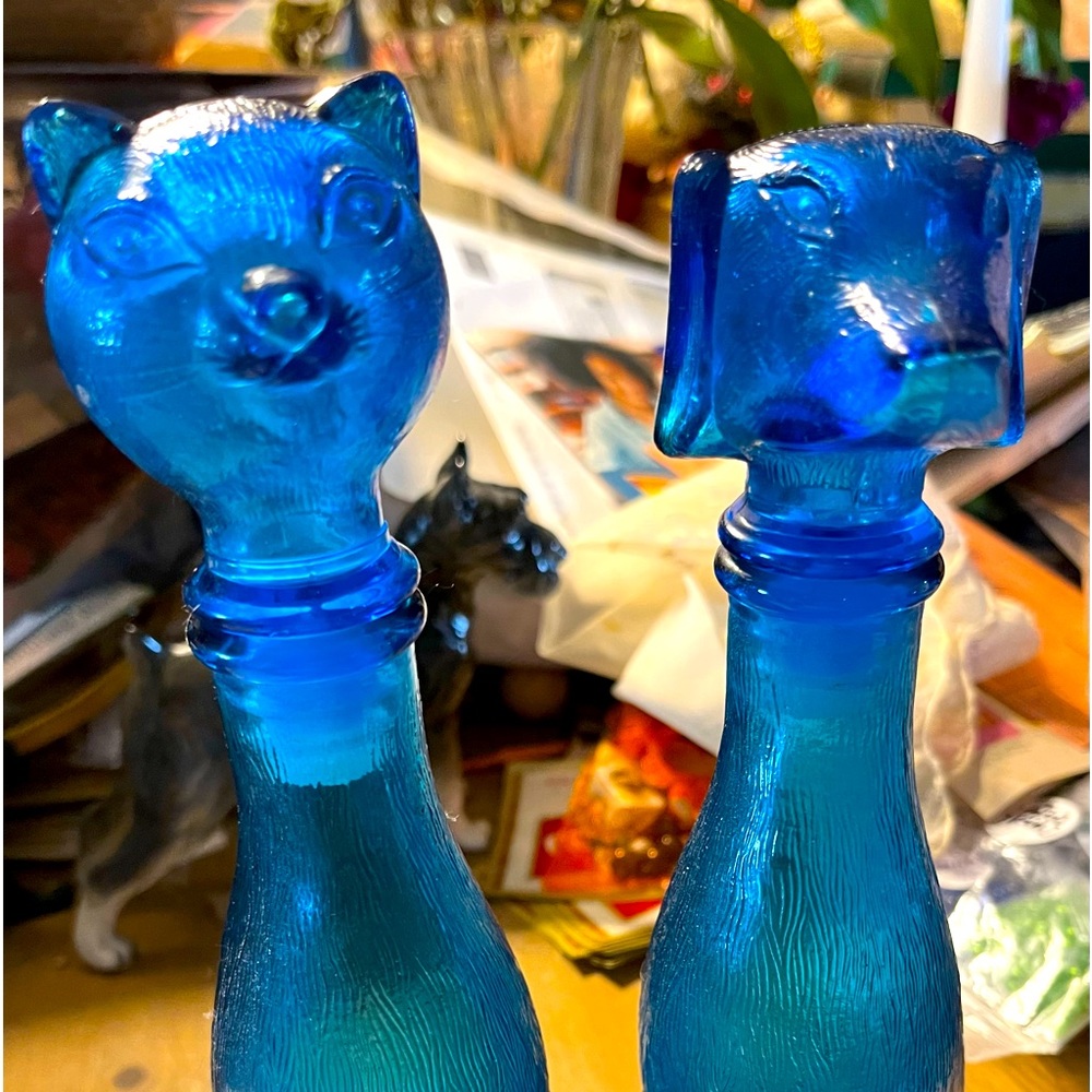 Vintage dog and cat glass decanters Italian genie bottles. Perfect shape.